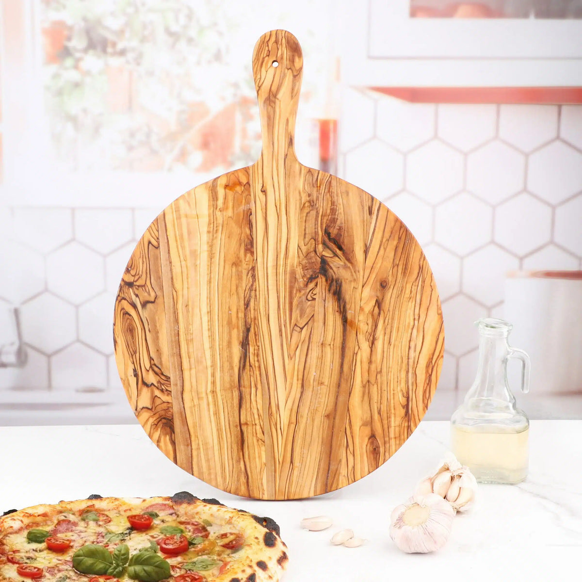 Pelle à pizza artisanale en bois d'olivier