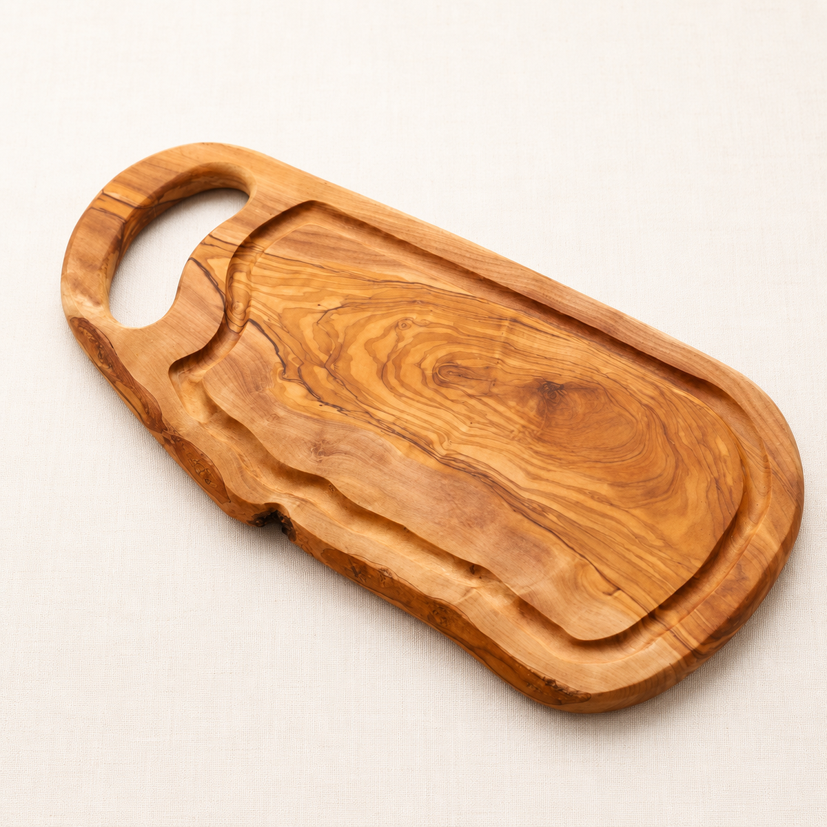 petite planche à découper artisanale en bois d'olivier