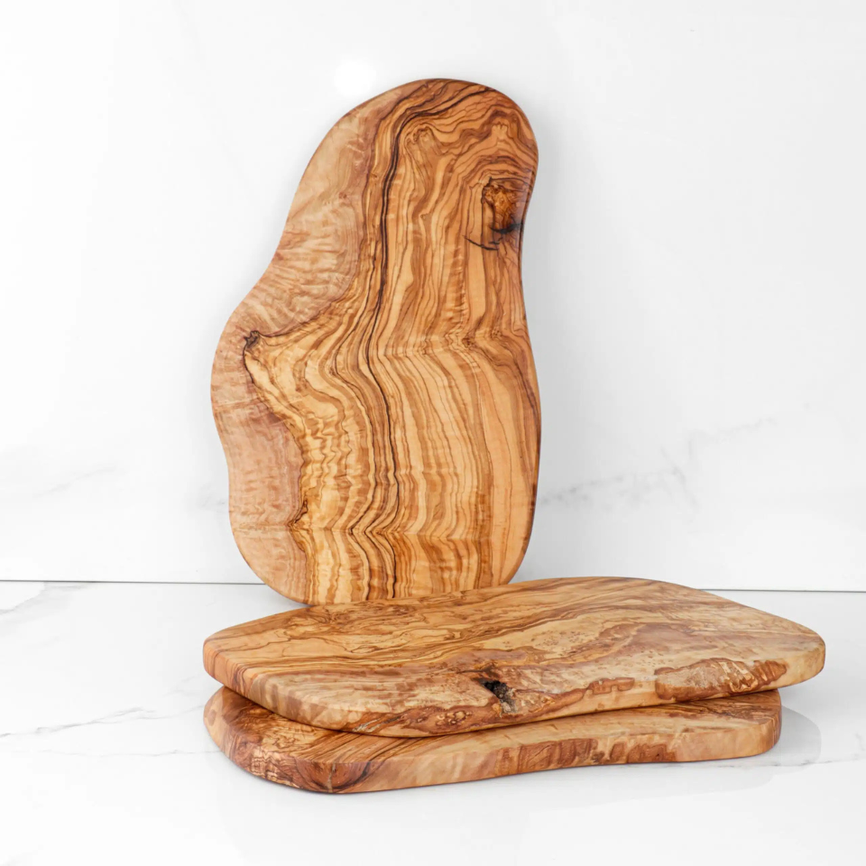 Planche à amuse-gueules en bois d'olivier façonnée à la main