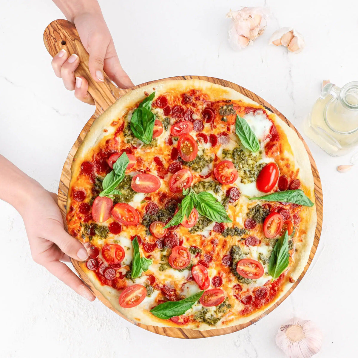 Pelle à pizza artisanale en bois d'olivier